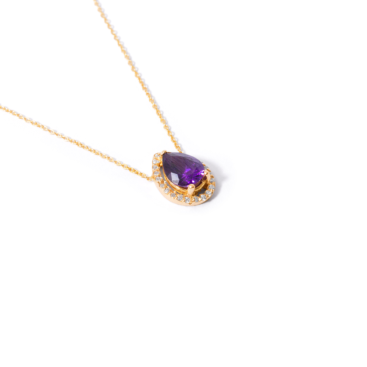 Gold necklace with purple tears around the gem G