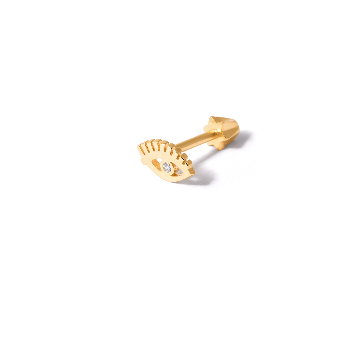 Gold piercing with jeweled eyes g